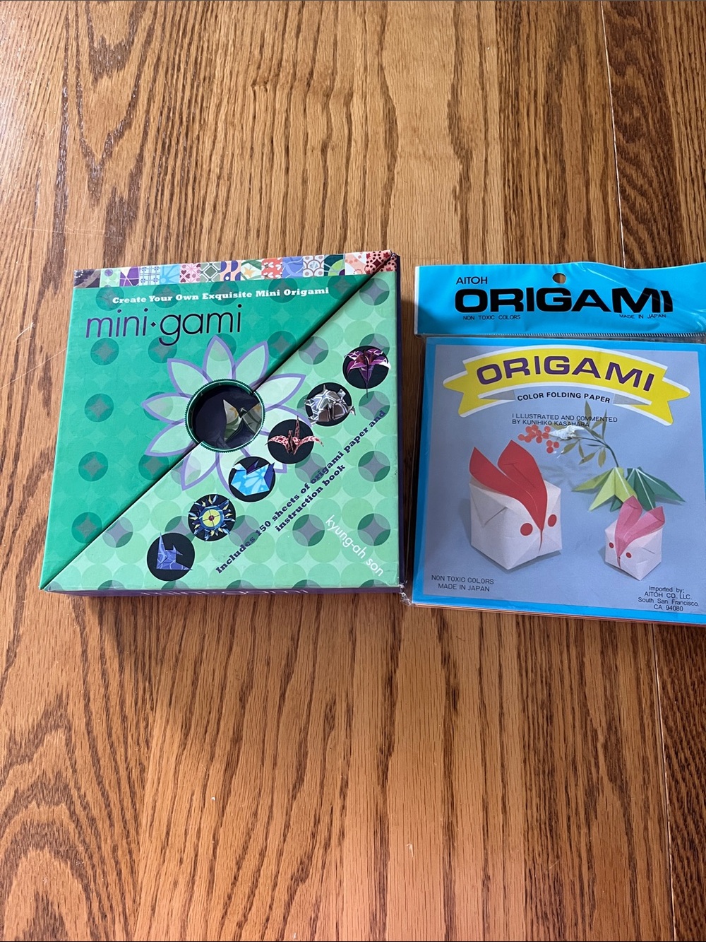 Origami (2) sets of Origami instructions and papers  Time to learn a new skill!